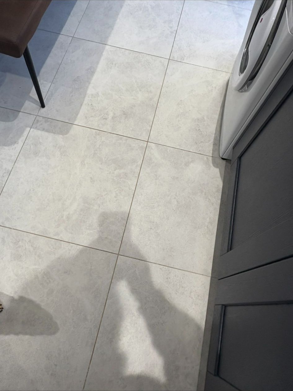 Kitchen tile floor spotlessly cleaned